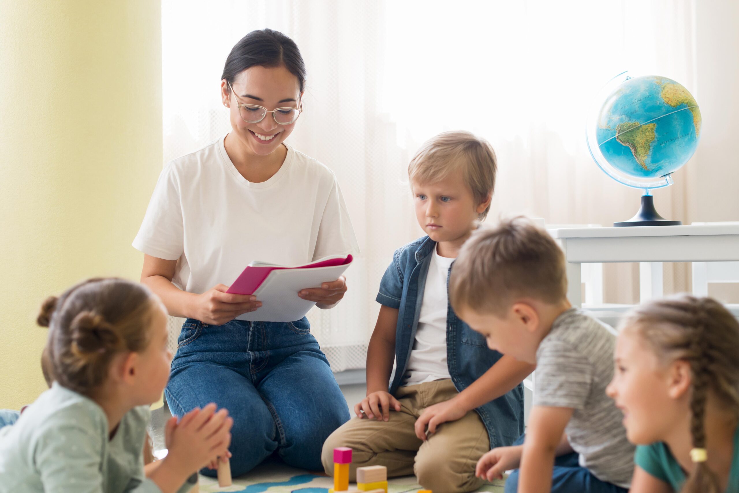 kindergarten-teacher-holding-notebook